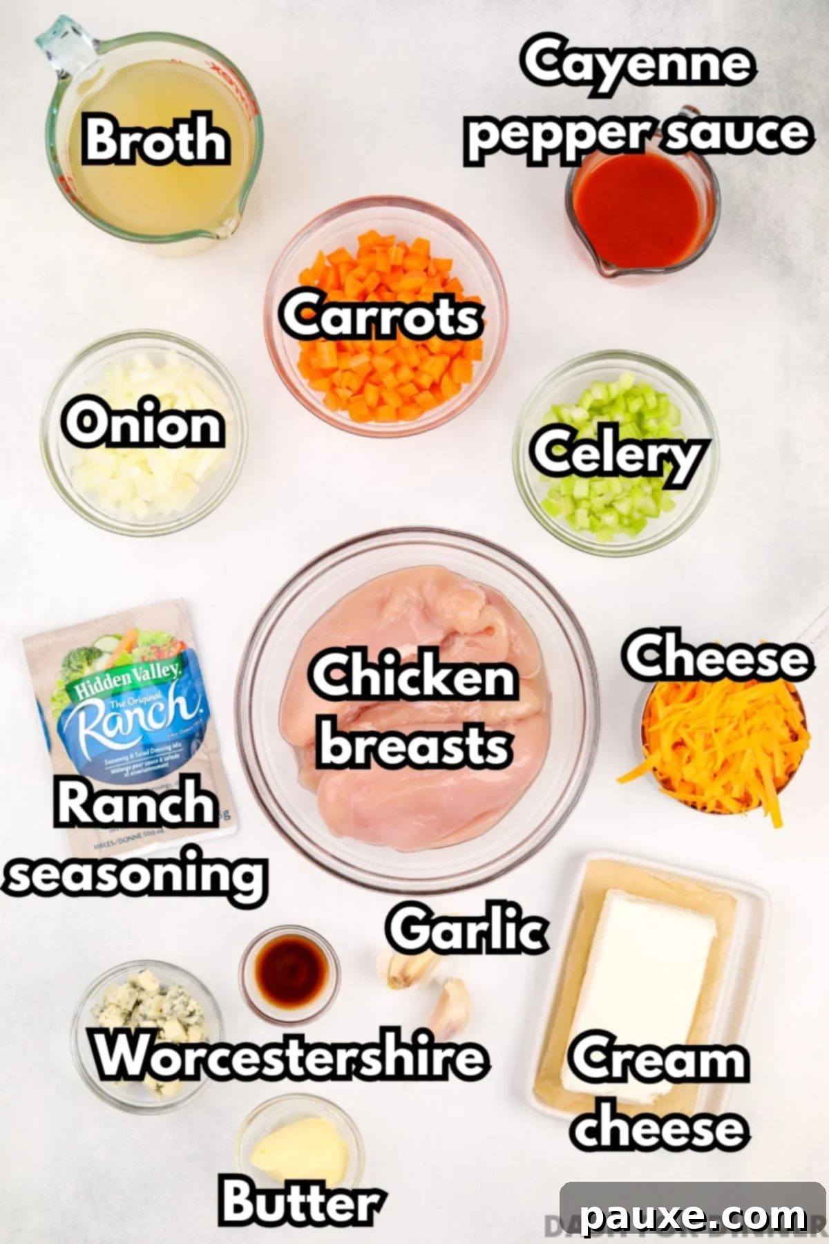 Spicy Buffalo Chicken Chowder 3 The ingredients laid out for making spicy chicken soup: chicken breasts, cream cheese, celery, onion, broth, and hot sauce.