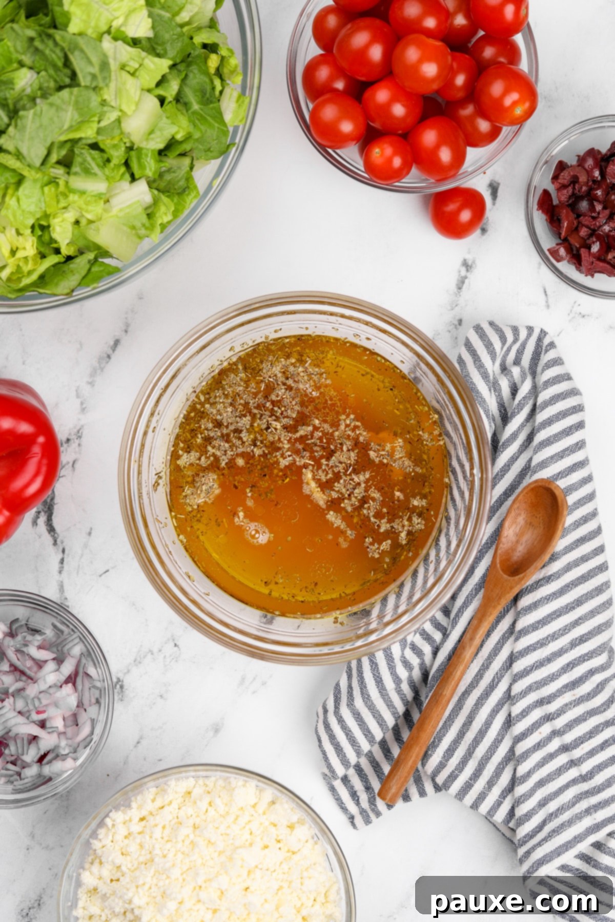 Zesty Mediterranean Vinaigrette 4 A bowl containing all the liquid ingredients for Greek vinaigrette, ready to be mixed.