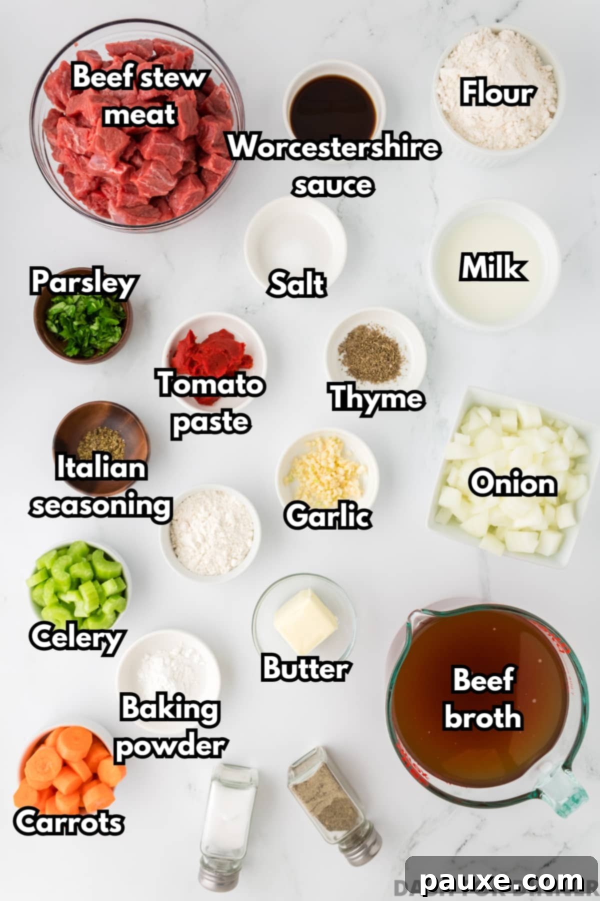 Comforting Slow Cooker Beef Stew and Dumplings 3 The ingredients needed to make beef stew, including stew meat, beef broth, carrots, flour, celery, and onions, neatly arranged on a counter.