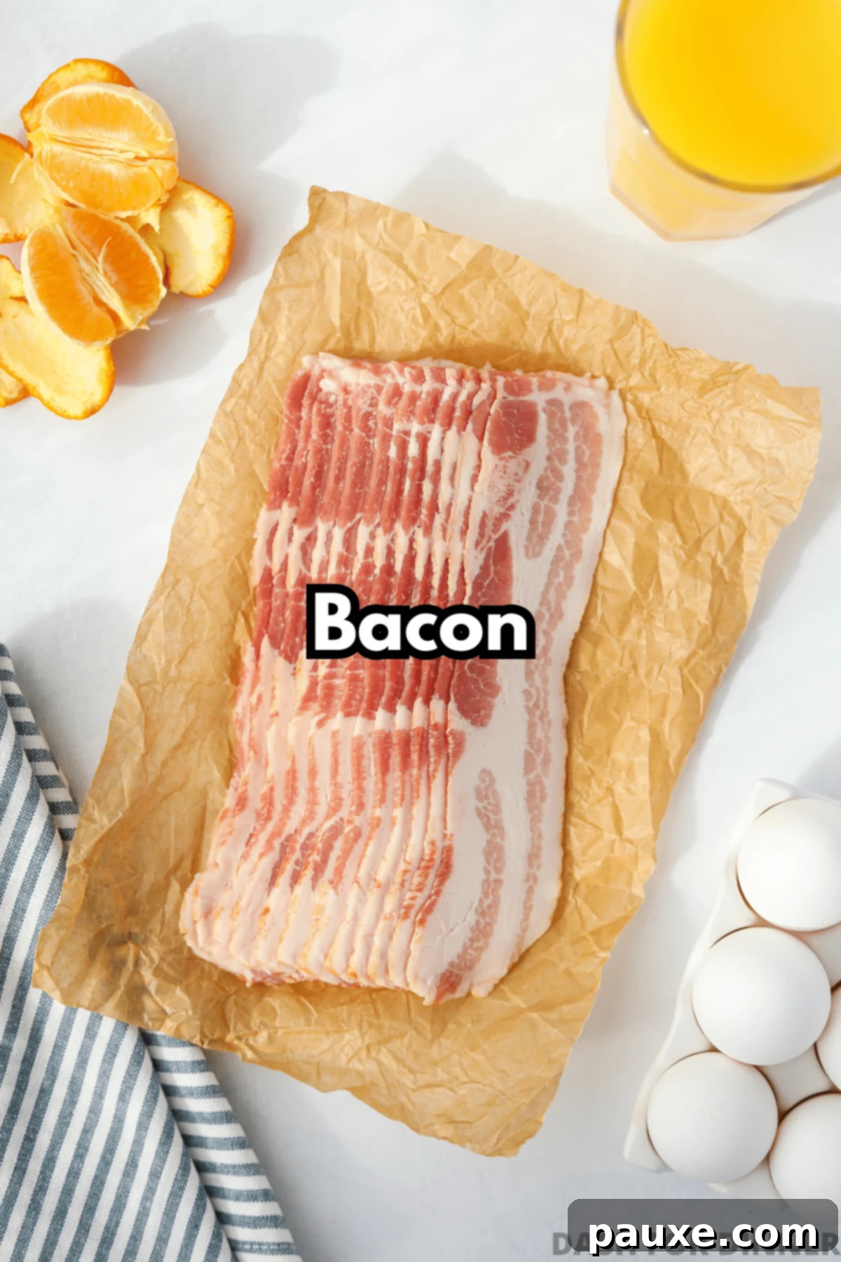 Crispy Air Fryer Bacon 3 Raw bacon slices arranged neatly on a cutting board, ready for the air fryer.