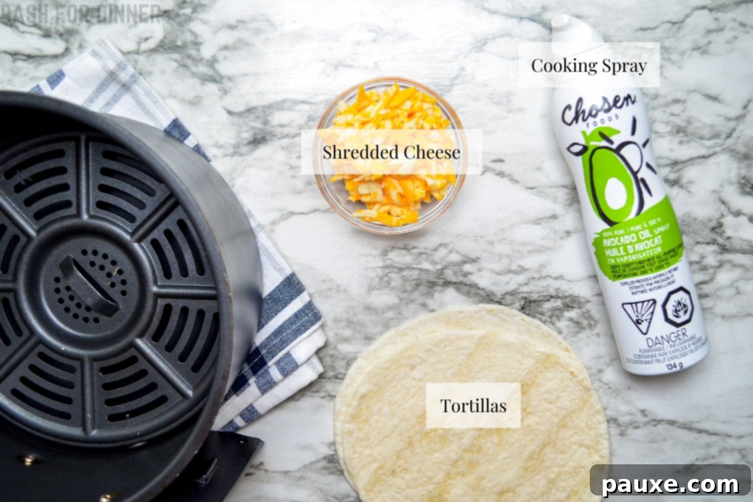 The simple ingredients required for air fryer quesadillas: tortillas, shredded cheese, and cooking spray.