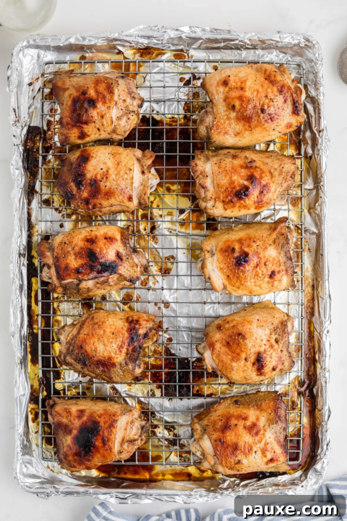 Mastering Chicken Marinades 7 Baked chicken thighs on a wire baking rack.
