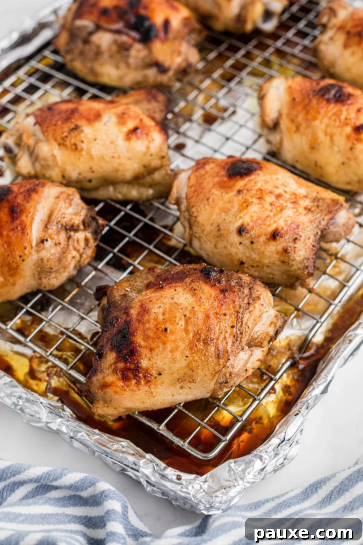 Mastering Chicken Marinades 8 Baked chicken thighs on a wire baking rack.