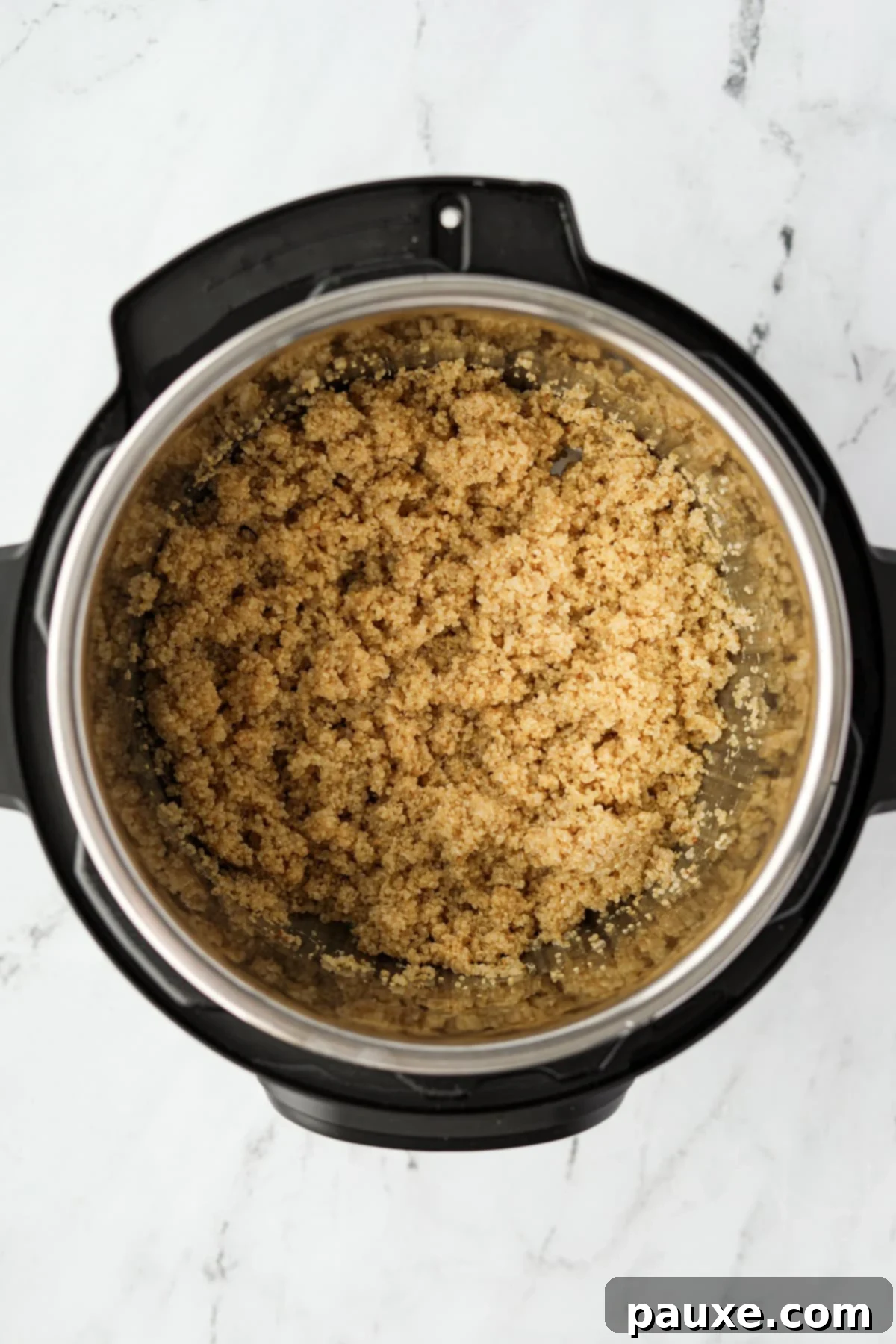 Effortless Instant Pot Quinoa 5 An Instant Pot filled with perfectly cooked, fluffy quinoa after natural release.