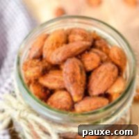 Crispy Golden Air Fryer Almonds 9 A jar of homemade roasted almonds.