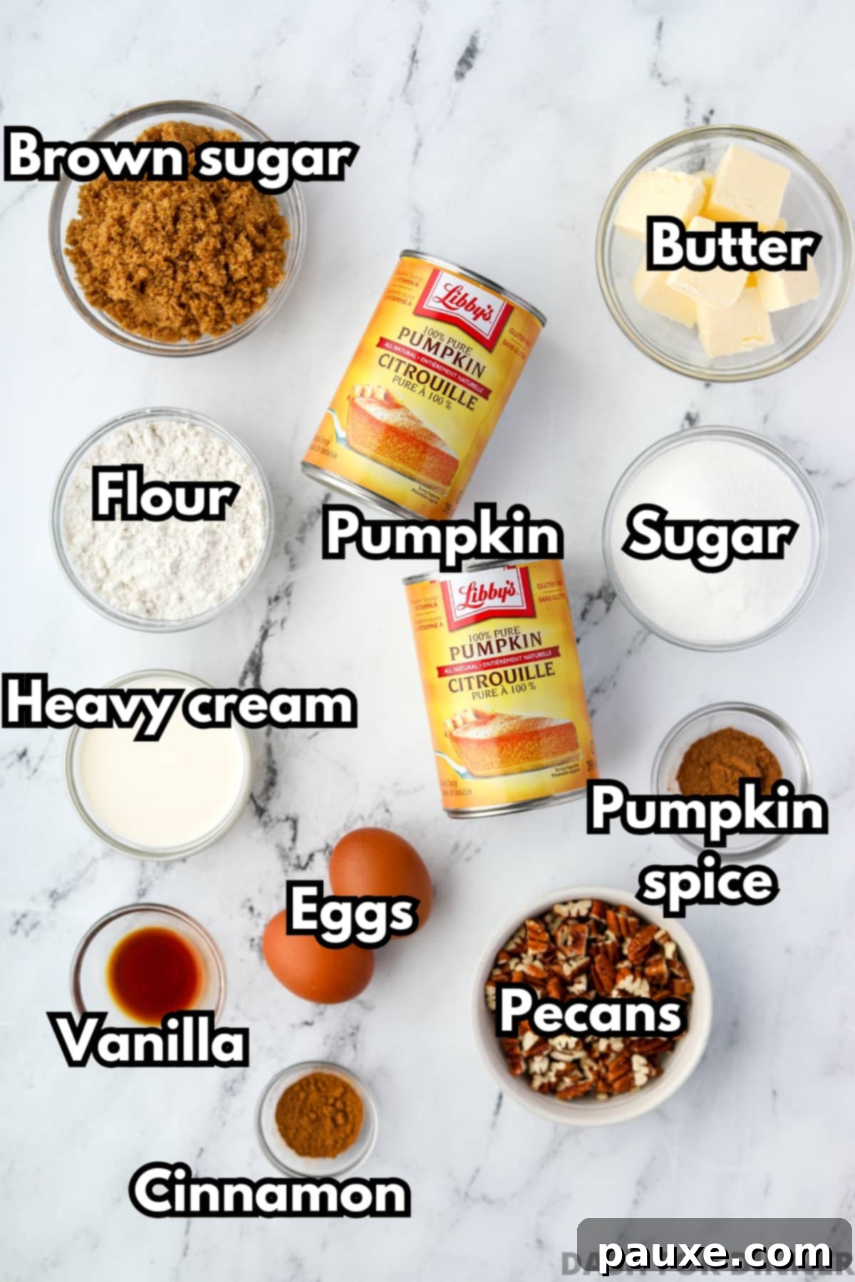 Golden Pumpkin Delight 3 The essential ingredients for pumpkin casserole displayed on a wooden surface, including cans of pumpkin puree, a bowl of heavy cream, fresh eggs, a pile of pecans, a measuring cup of brown sugar, and sticks of butter.