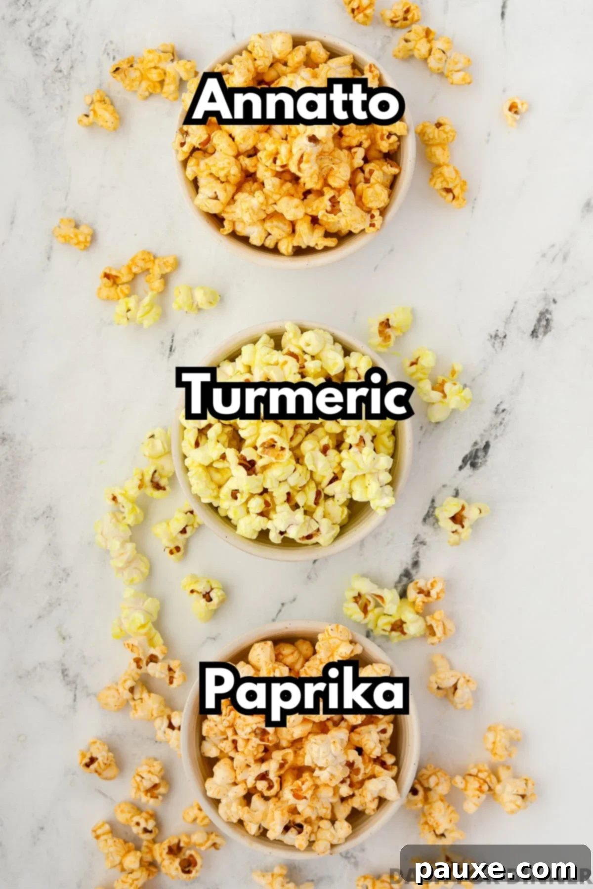 Golden Popcorn Topping 4 Three small bowls of popcorn with various seasonings added for color.