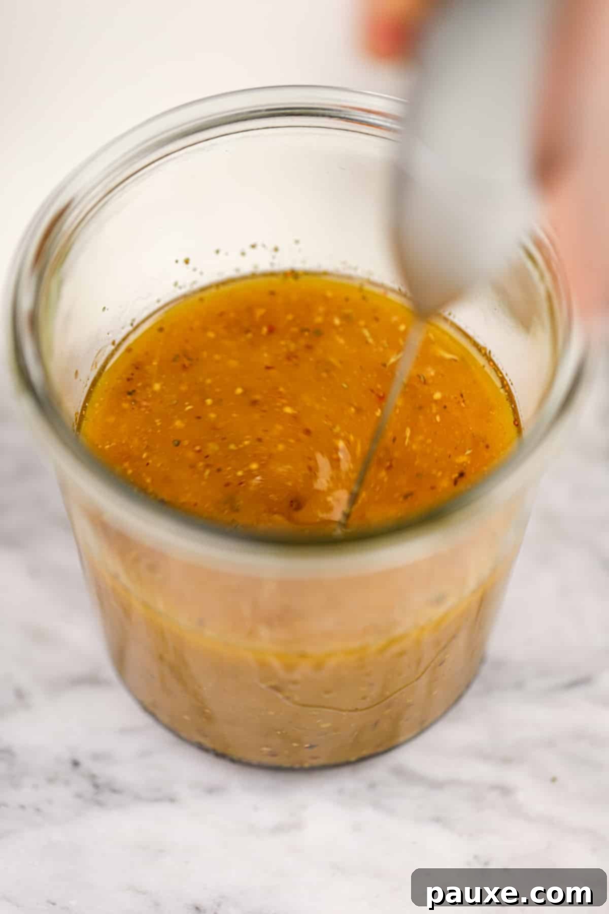 Mediterranean Sunset Vinaigrette 6 A small frothing want emulsifying a homemade dressing.