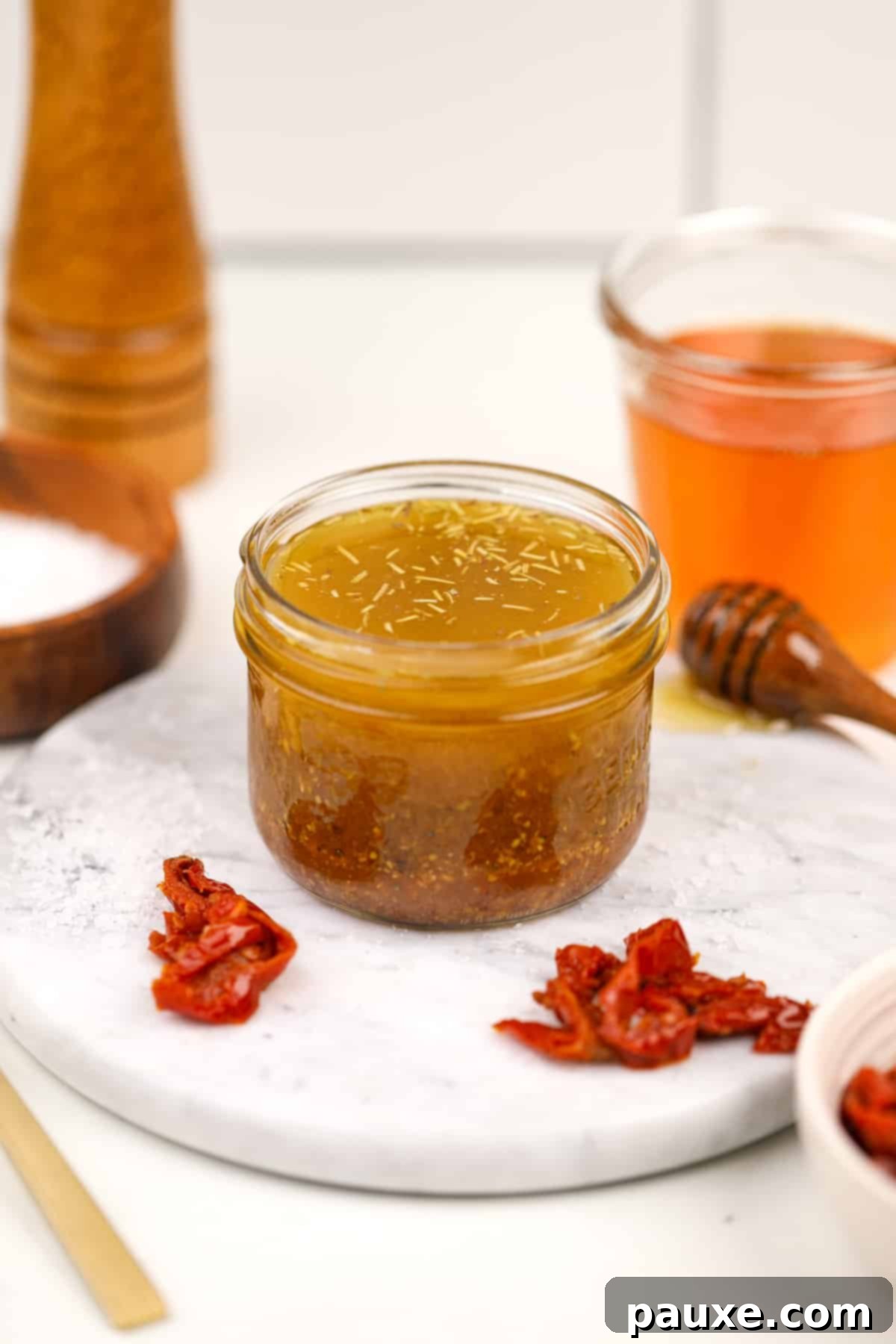 Mediterranean Sunset Vinaigrette 8 A mason jar filled with homemade dressing.