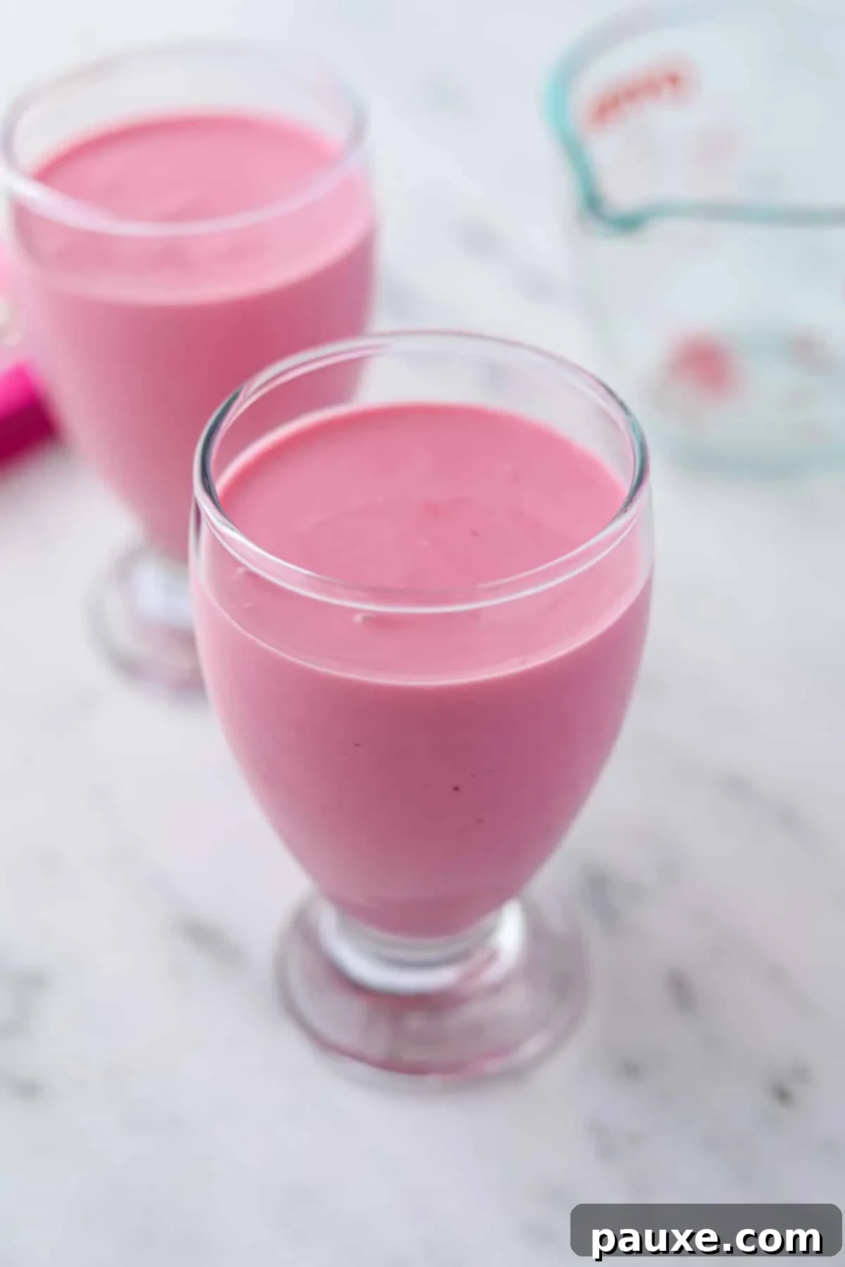 Creamy Greek Yogurt Delight 7 Parfait glasses filled with greek yogurt jello mousse.