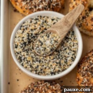 The Ultimate Seed & Spice Blend 9 A small bowl of everything bagel seasoning with a small wooden spoon.