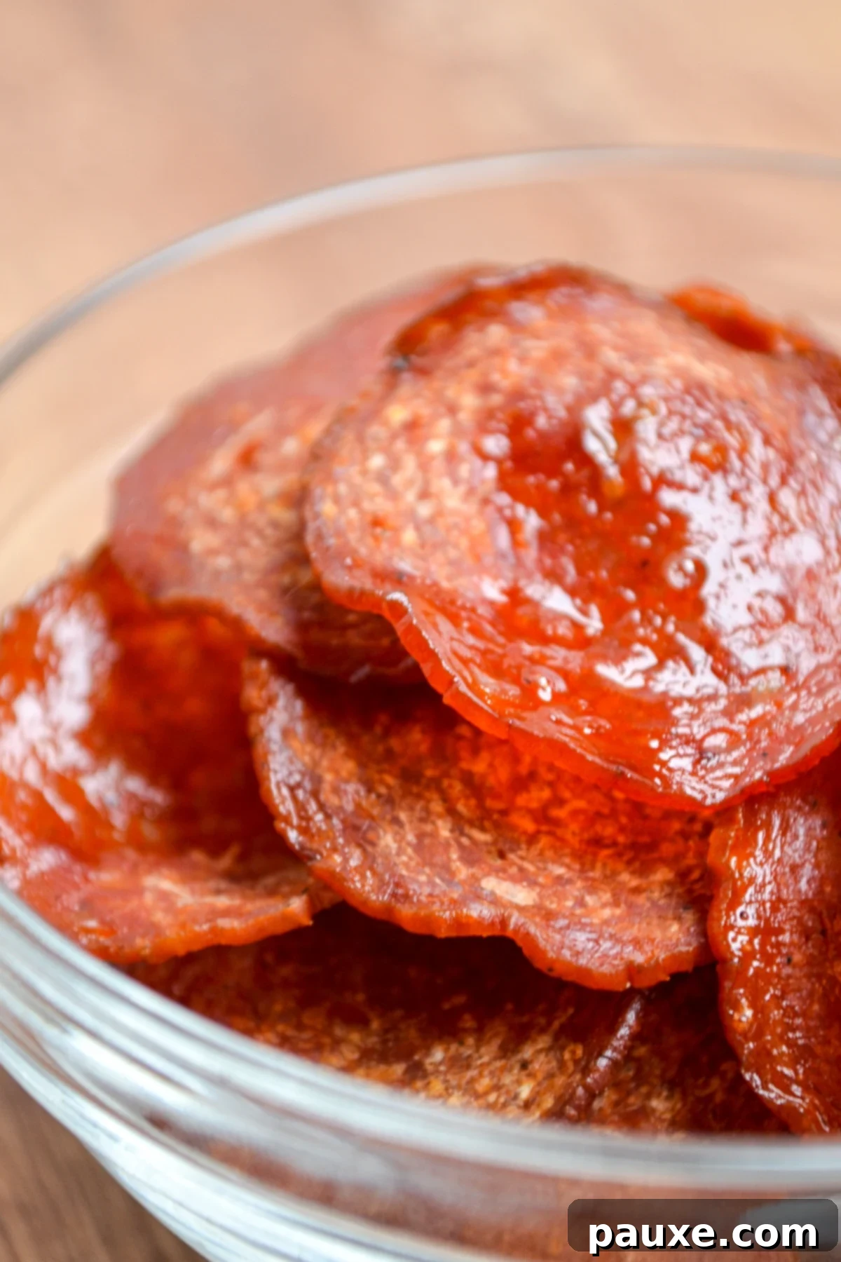 Air Fried Crispy Pepperoni 2 Air fryer pepperoni chips in a small snack bowl.