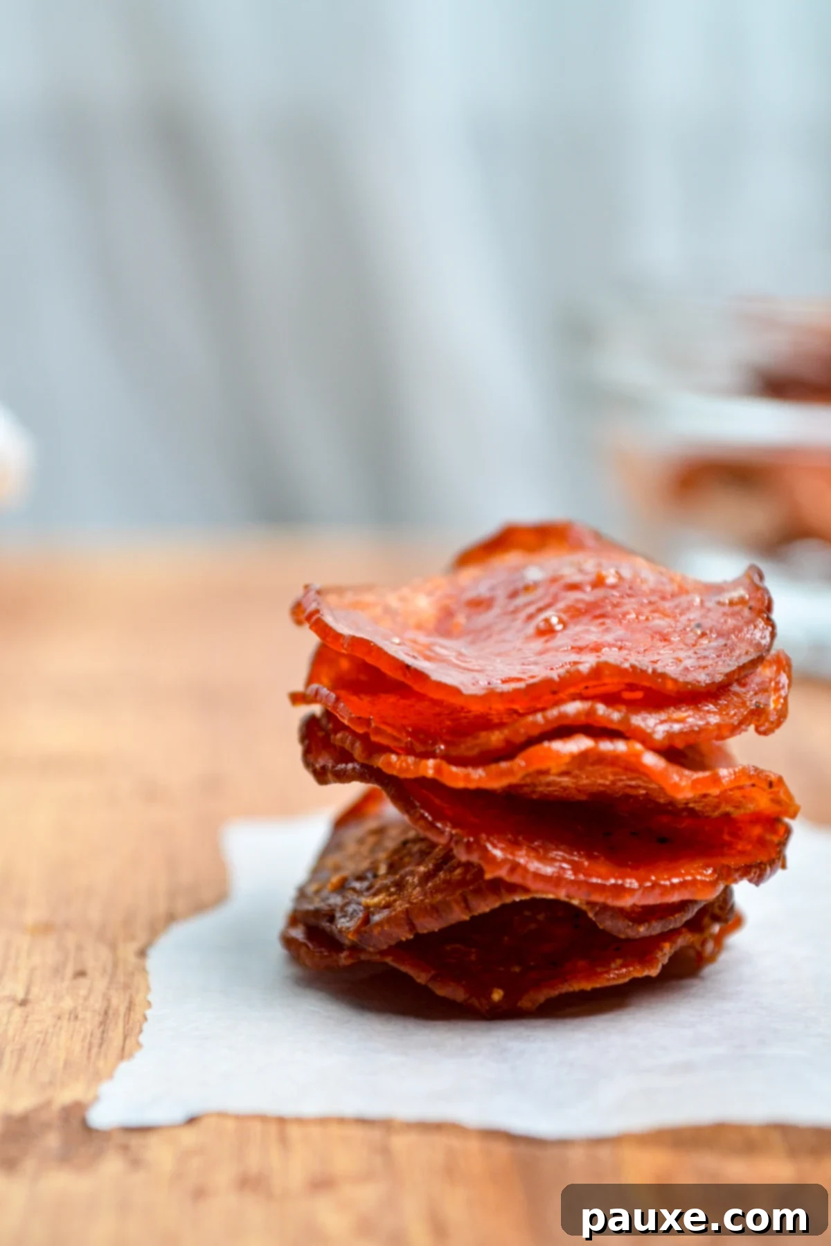 Air Fried Crispy Pepperoni 3 Air fryer pepperoni chips stacked in a tower.