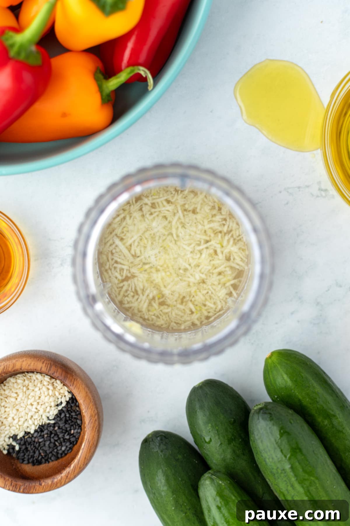 Grated garlic mellowing in a small amount of rice vinegar.