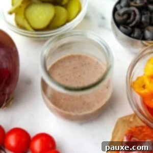 The Sub Secret 8 A small jar of sub sauce, surrounded by sub fillings.