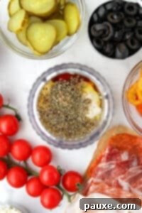 The Sub Secret 9 A small jar blender filled with olive oil, oregano, red wine vinegar, etc.