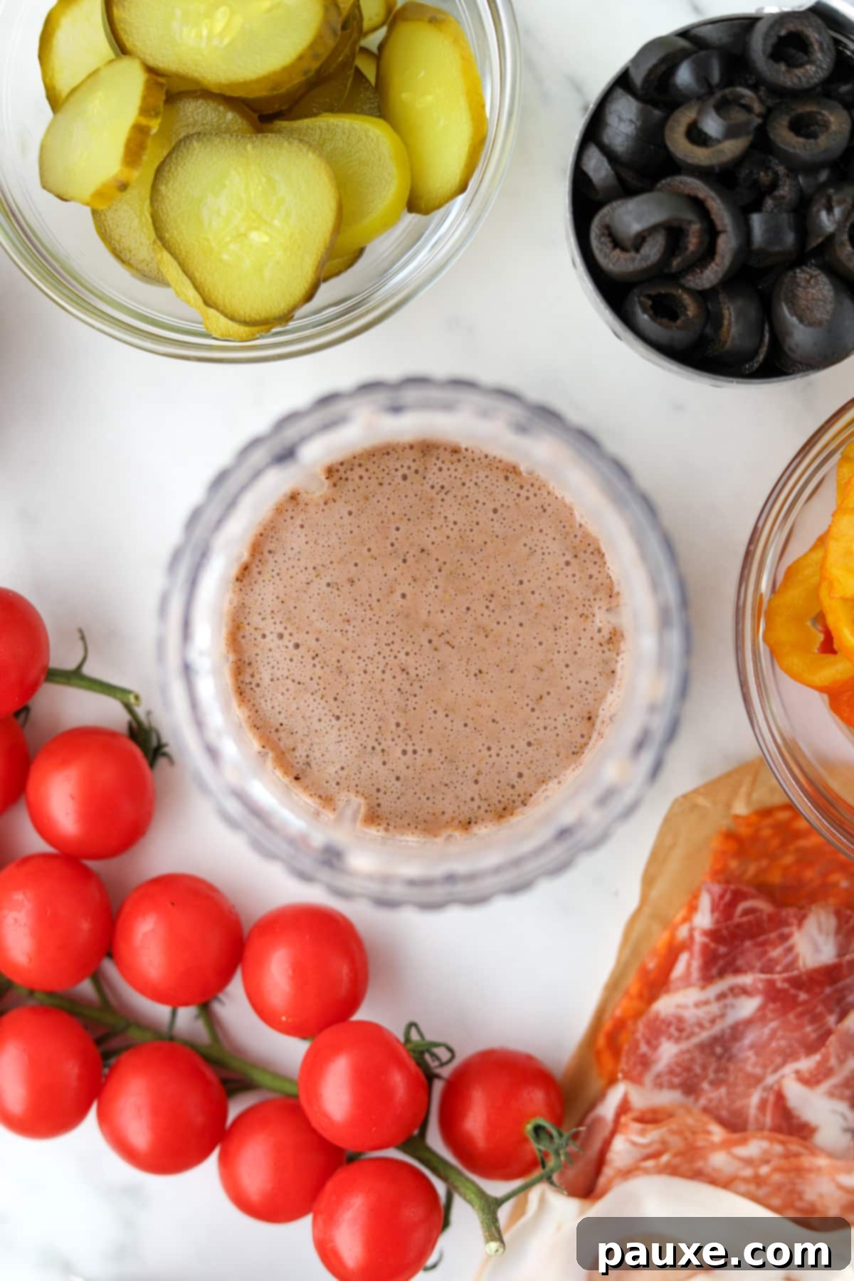 The Sub Secret 5 A small jar blender filled with creamy Italian sub dressing, perfectly blended.