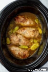 Mississippi Pot Roast Chicken 15 Chicken cooked in a slow cooker with seasoning, broth, and pepperoncini peppers.
