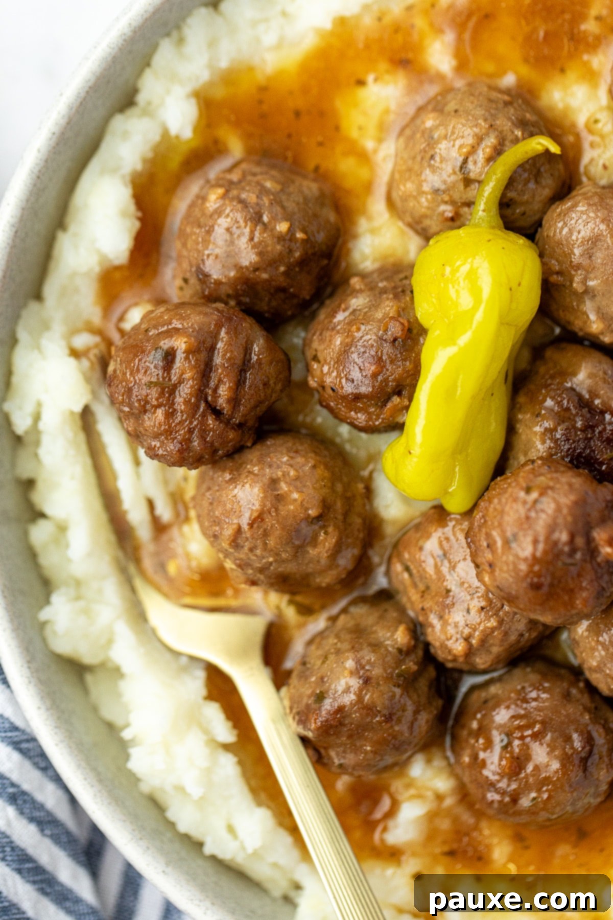 Dixie Glazed Meatballs 8 Mashed potatoes topped with meatballs and a thin sauce.