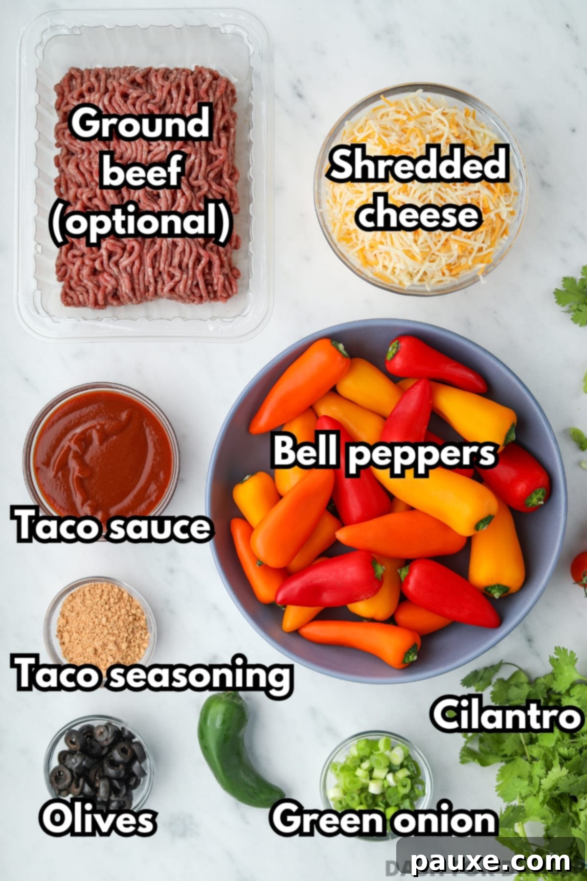 Bell Pepper Nacho Boats 3 A beautiful arrangement of fresh ingredients necessary for making bell pepper nachos, including a variety of shredded cheeses, a packet of taco seasoning, fresh cilantro, and a sliced jalapeno, all ready for preparation.