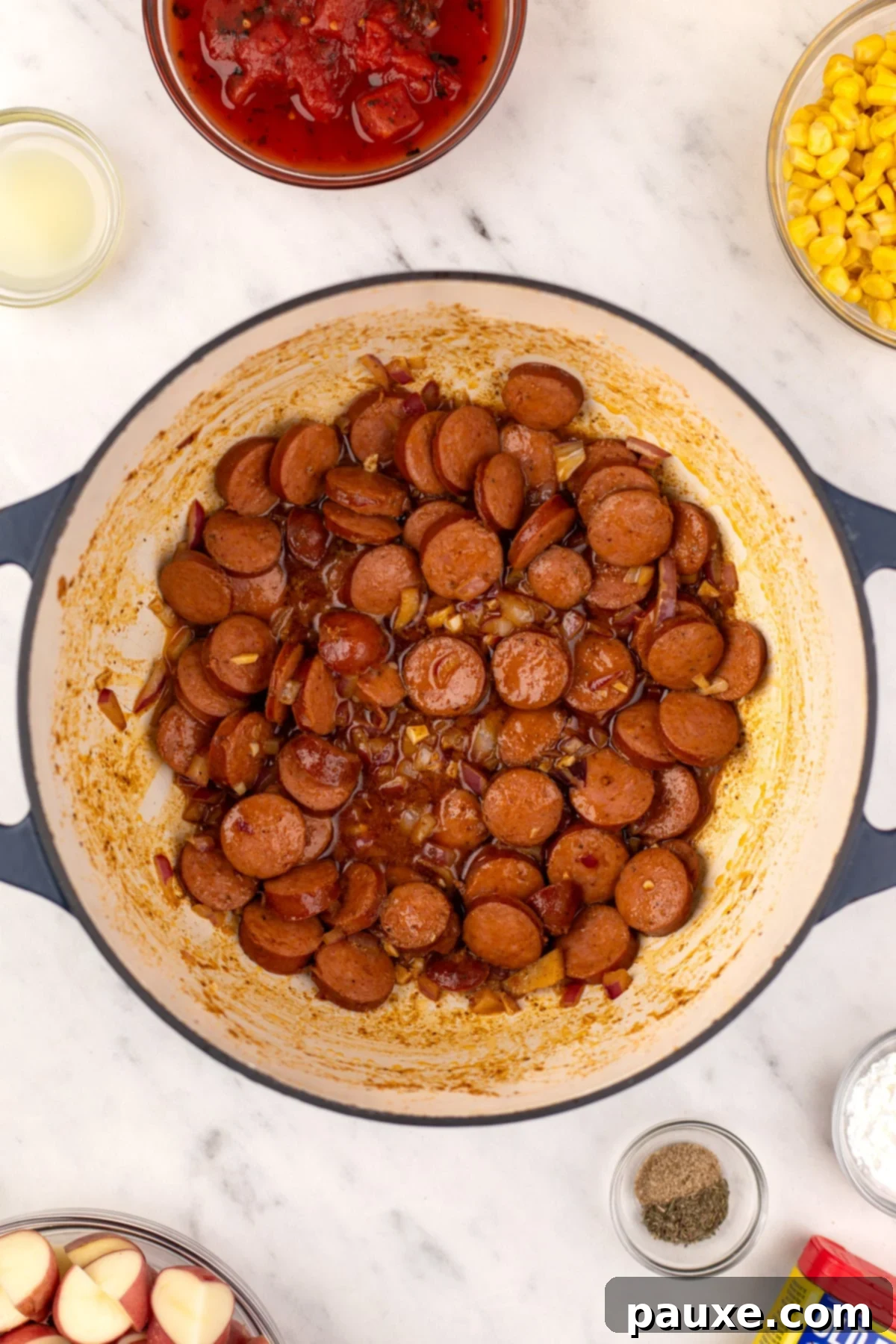 Mossy Potage 4 A Dutch oven on the stove with lightly browned, sliced smoked sausage sizzling in seasoned butter.