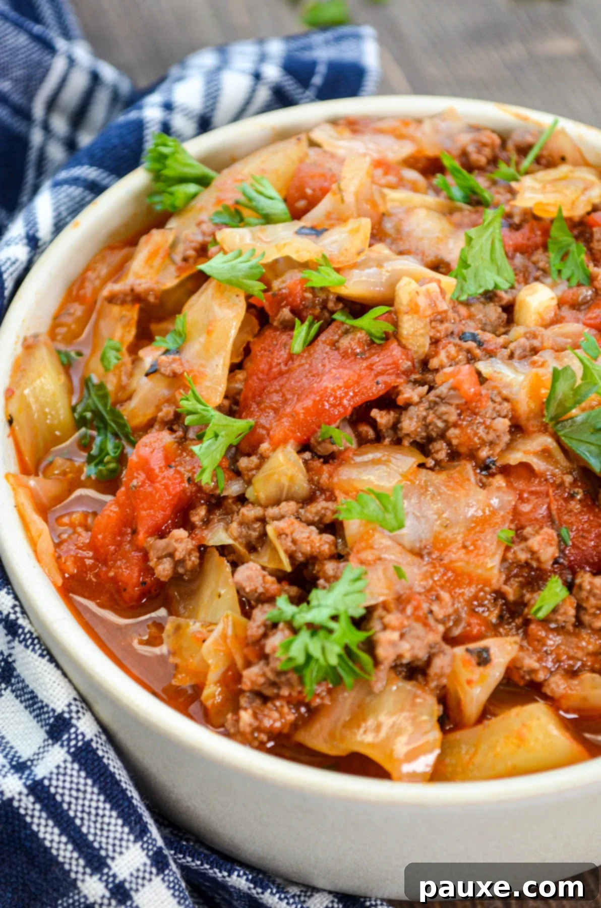 Instant Pot Lazy Cabbage Roll Dinner 8 A close up of a bowl of unstuffed cabbage rolls.