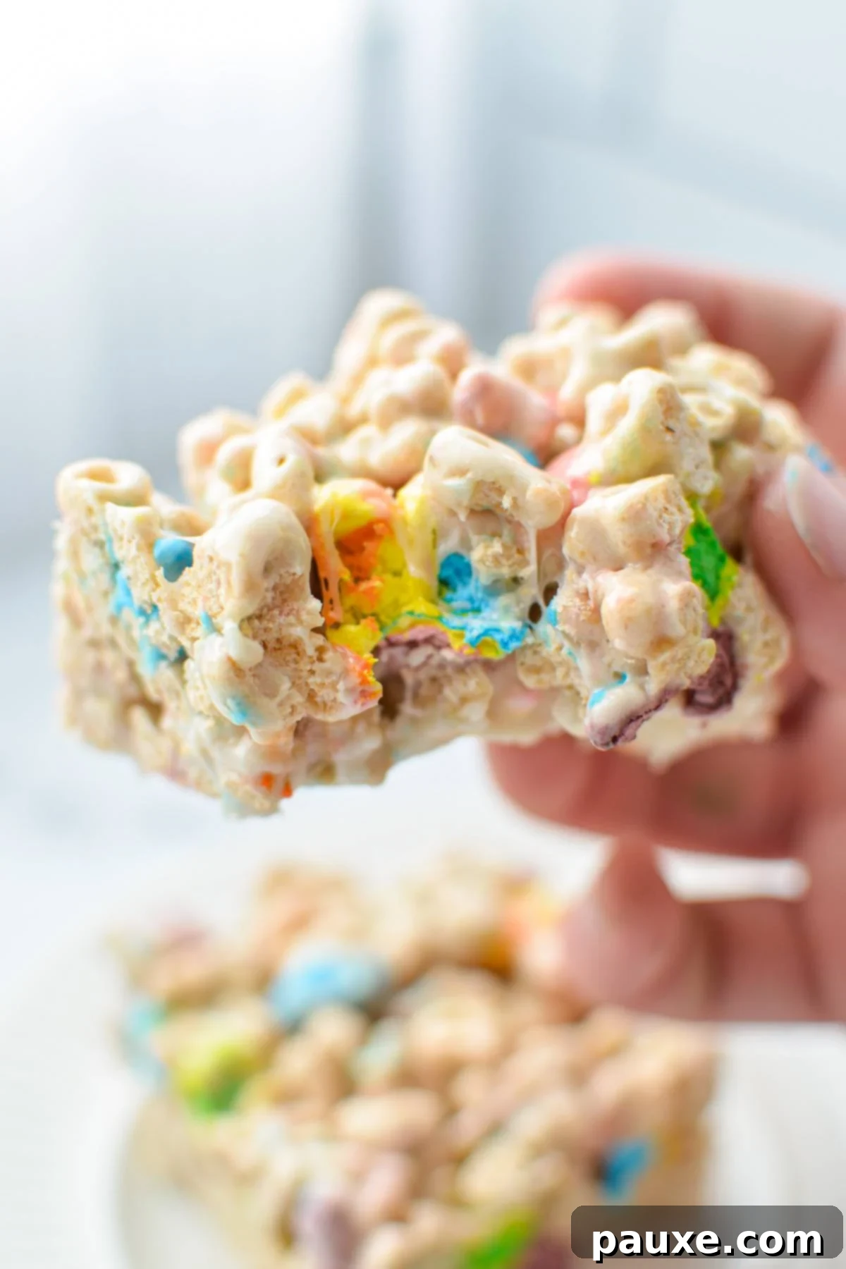 Magical Marshmallow Bites 9 A single Lucky Charms treat with a bite taken out, showing the gooey interior.