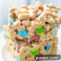 Magical Marshmallow Bites 10 Two Lucky Charms treats stacked on top of one another.