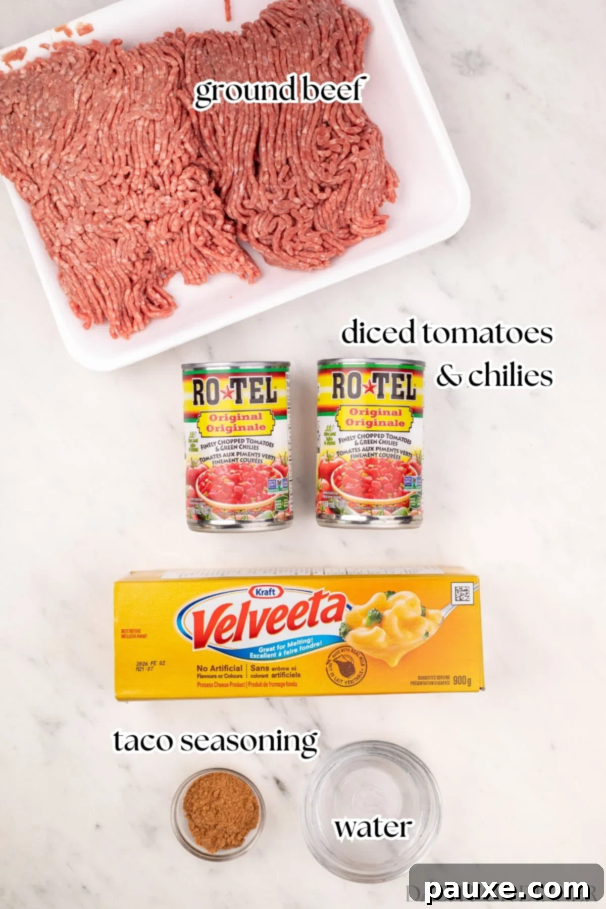 The simple ingredients needed to make slow cooker Rotel dip, including ground beef, Rotel diced tomatoes and green chilies, Velveeta cheese, and taco seasoning.