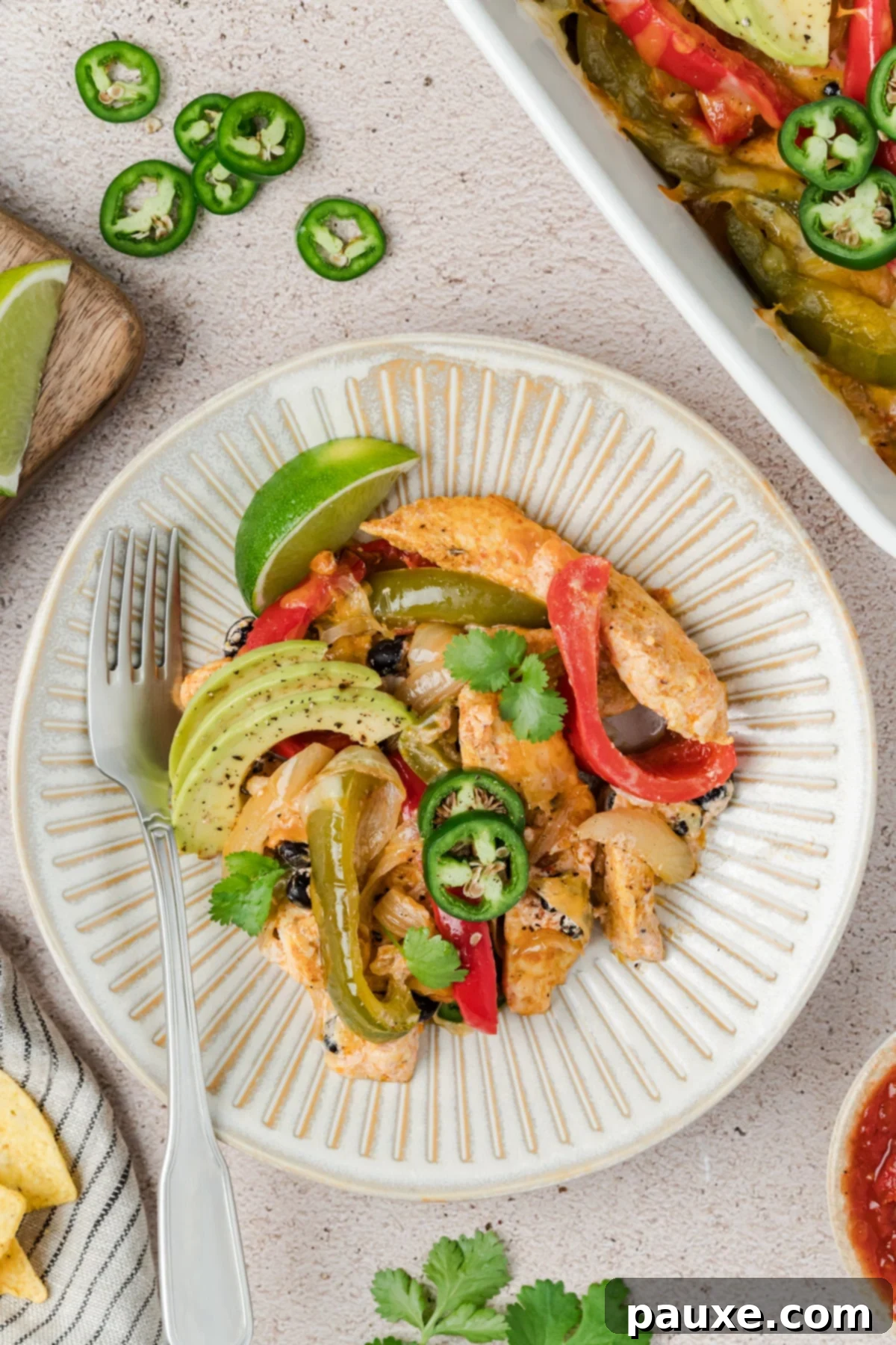 A serving of Chicken Fajita Casserole with avocado