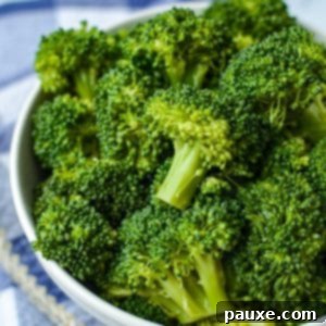 Effortless Instant Pot Broccoli 7 A bowl of broccoli that has been cooked to perfection, vibrant green and ready to eat.