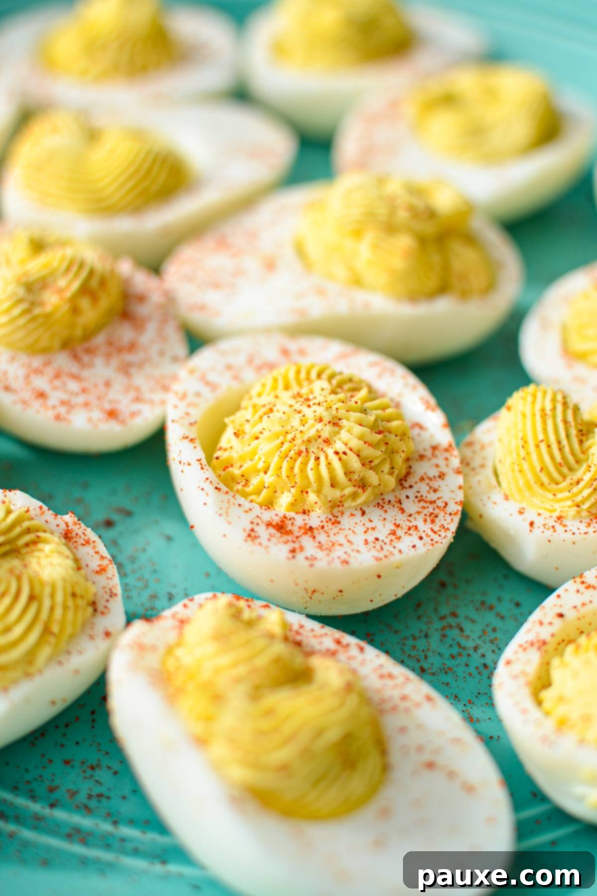 Effortless Instant Pot Deviled Eggs 10 Deviled eggs that have been sprinkled with paprika.