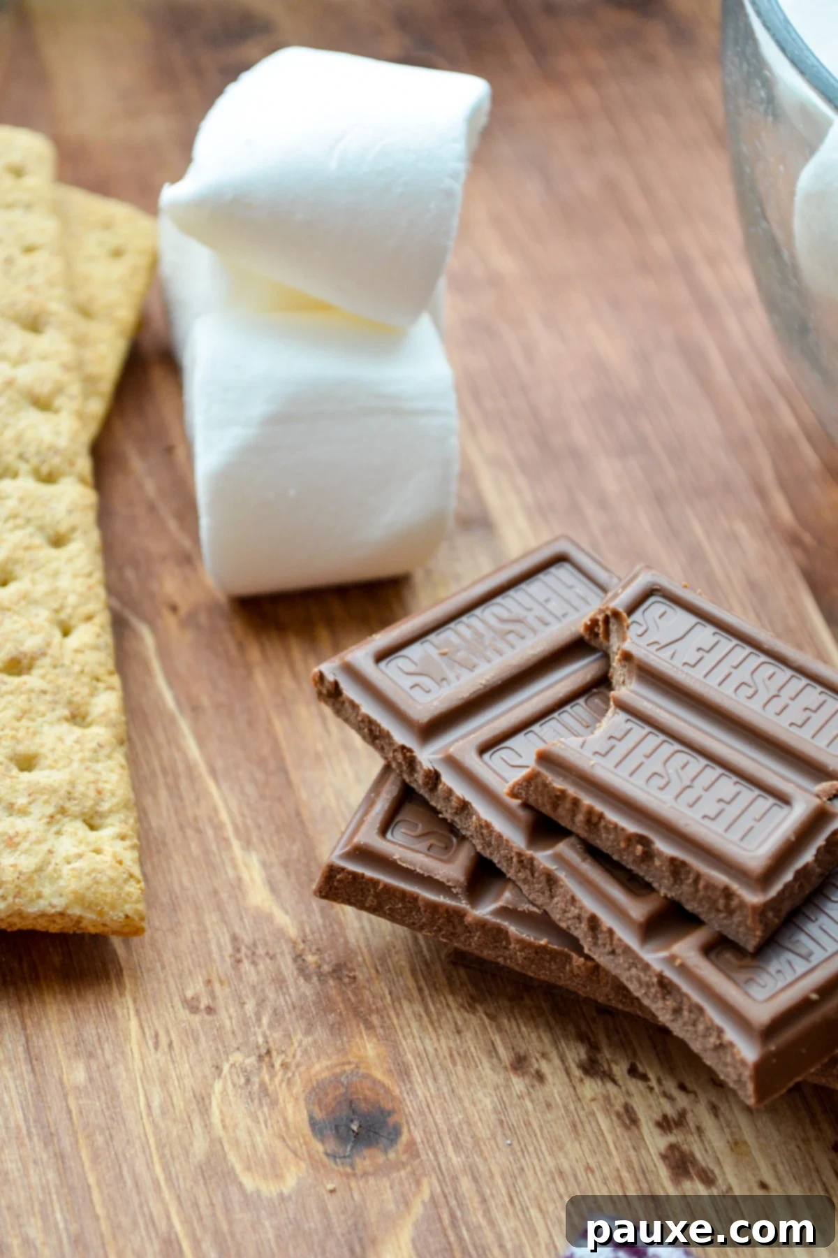 Air Fryer S'mores Magic 3 A few bars of chocolate, some marshmallows, and some graham crackers.