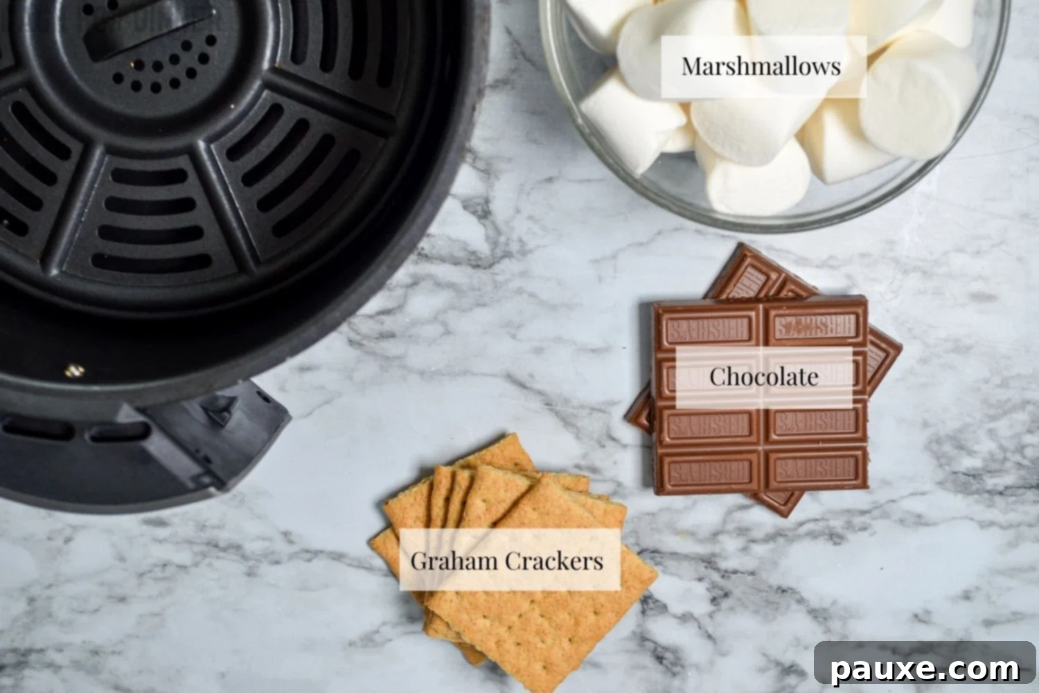 Air Fryer S'mores Magic 4 Ingredients needed to make smores in the air fryer.