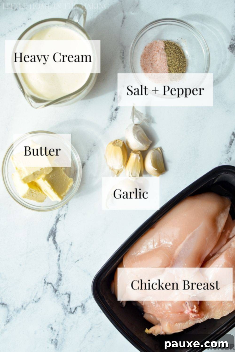 Simple Keto Low Carb Creamy Garlic Chicken Skillet 3 The ingredients needed to make creamy garlic chicken, including heavy cream, butter, and garlic.