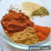 Taco Night Magic Spice 7 A small bowl filled with various seasonings that come together to make taco seasoning.