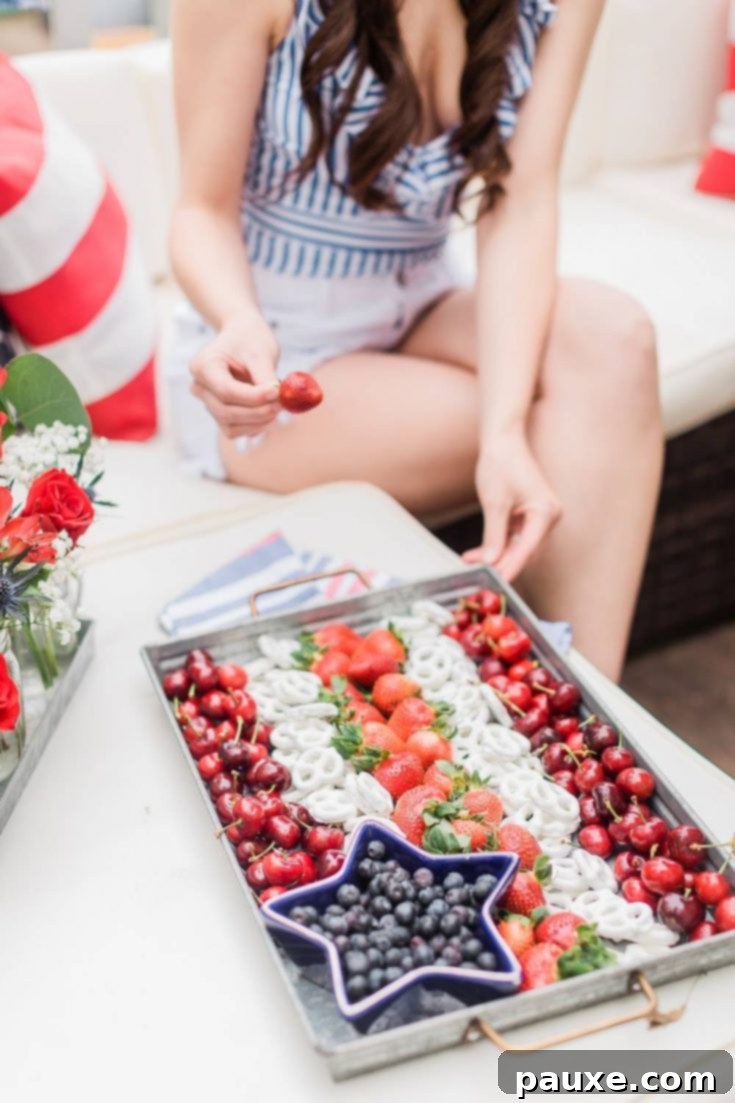 An American Flag themed patriotic fruit platter, featuring a healthy and vibrant array of berries.