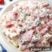 Red, White, and Blue Cheesecake Berry Bliss 11 A bowl of berry cheesecake salad.