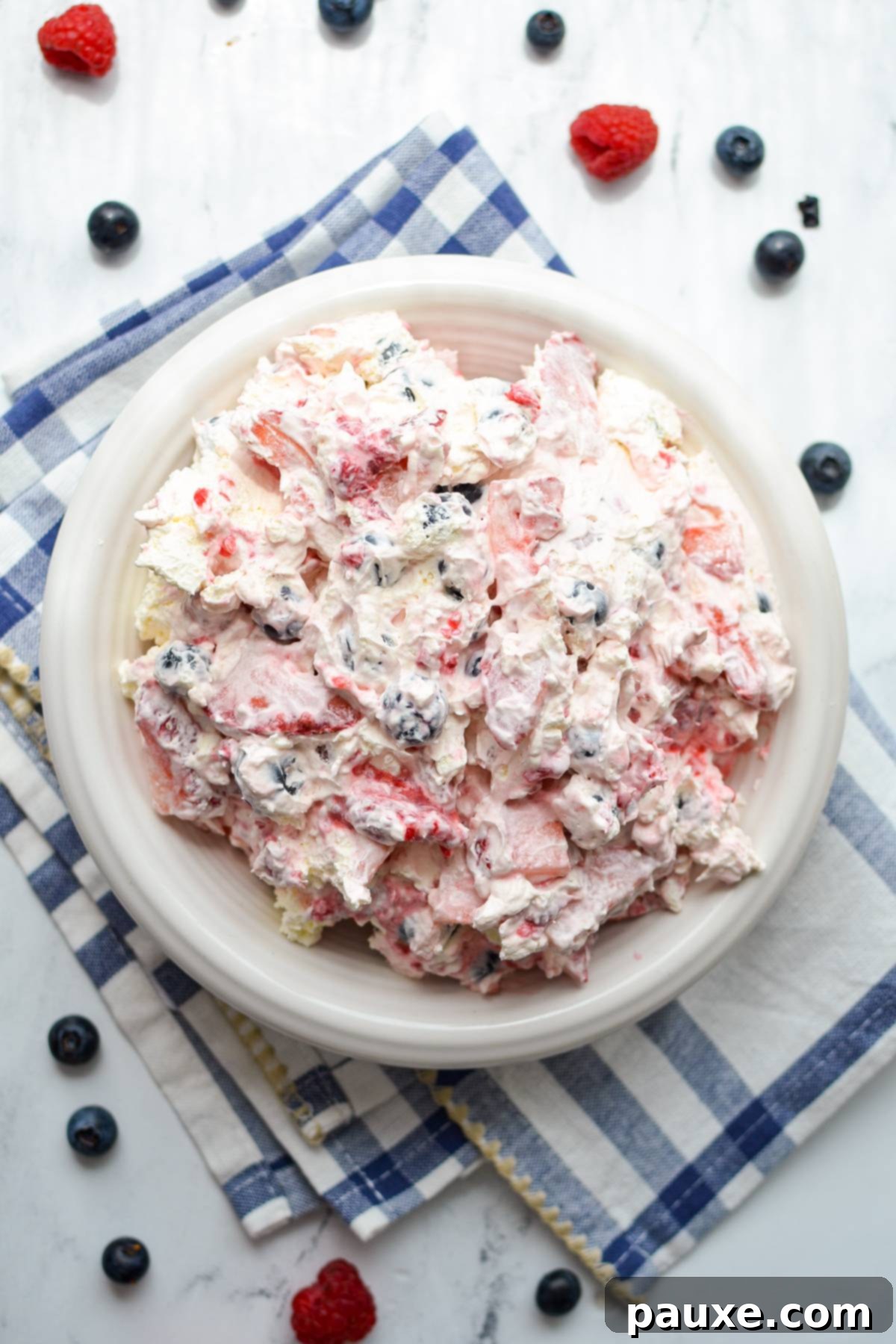 Red, White, and Blue Cheesecake Berry Bliss 10 An overhead view of a bowl of red white and blue cheesecake salad.