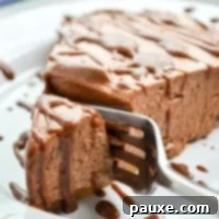A slice of no bake nutella pie, showcasing its smooth filling and crunchy crust.