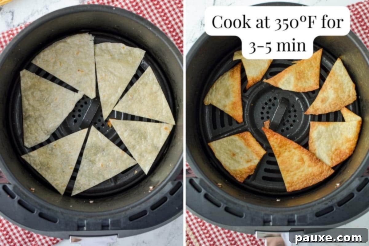 An air fryer basket with tortilla chips.