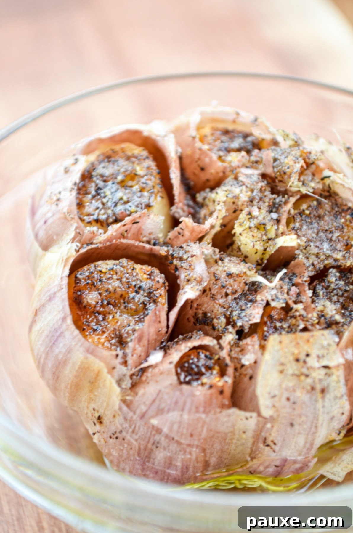 Perfect Air Fryer Roasted Garlic 2 A golden-brown bulb of roasted garlic, prepared to perfection in an air fryer, ready to be enjoyed.