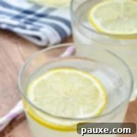 Instant Pot Zesty Lemonade 9 Instant pot lemonade, served in glasses with a lemon slice.