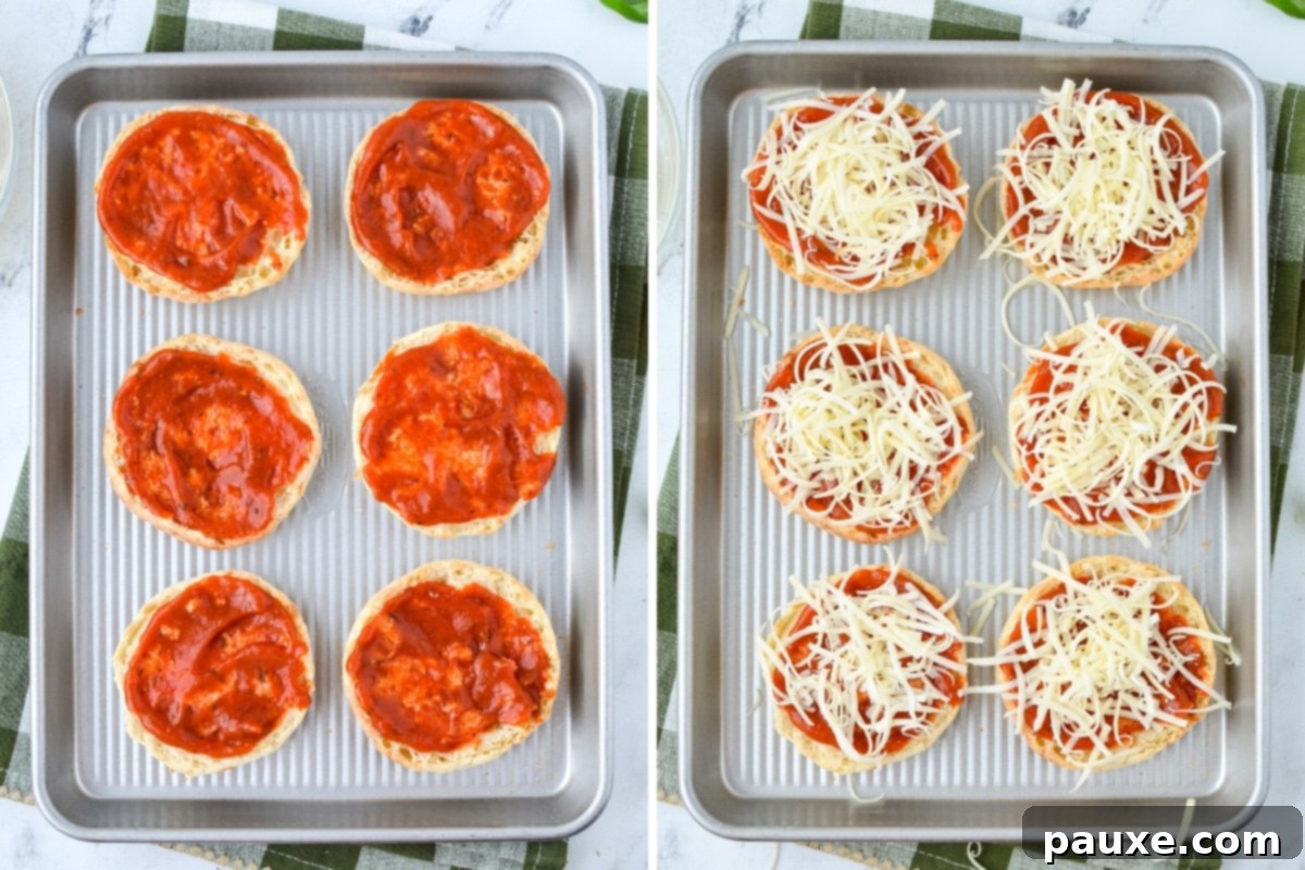 English muffins spread with pizza sauce and then topped with cheese.