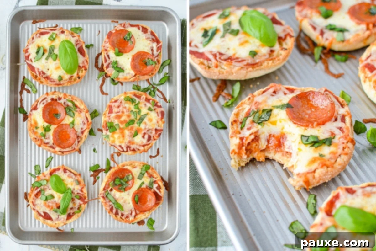 Mini pizzas topped with fresh basil.