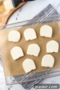 Golden Air Fryer Halloumi 12 An air fryer tray with halloumi cheese slices.