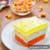 Spooky Layered Gelatin 15 A jello dessert with three layers, using Halloween inspired colors. Orange, yellow, and white layers.