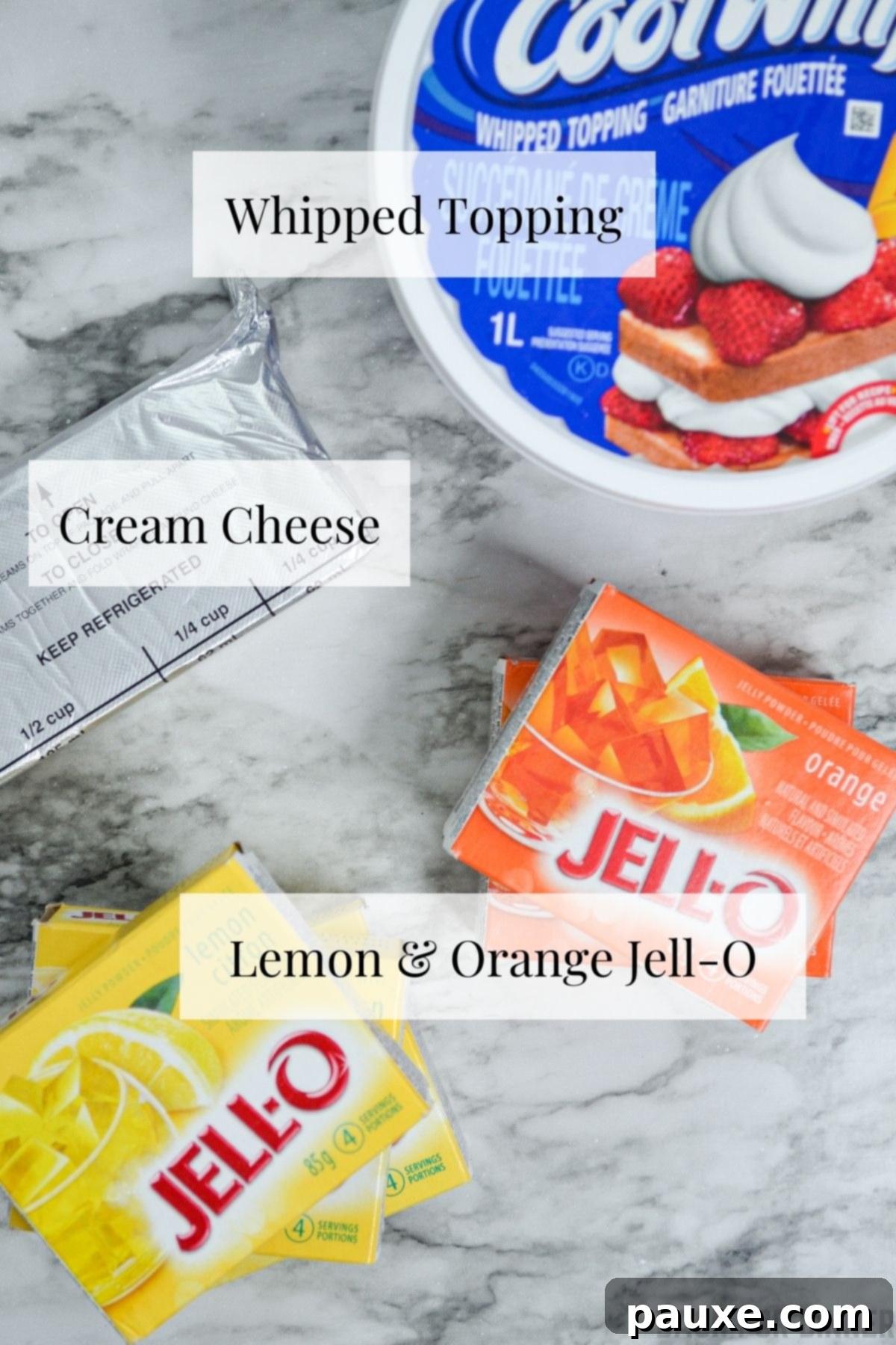 Spooky Layered Gelatin 4 All the ingredients neatly arranged for making layered Halloween Jello: Jell-O boxes, cream cheese, and Cool Whip.