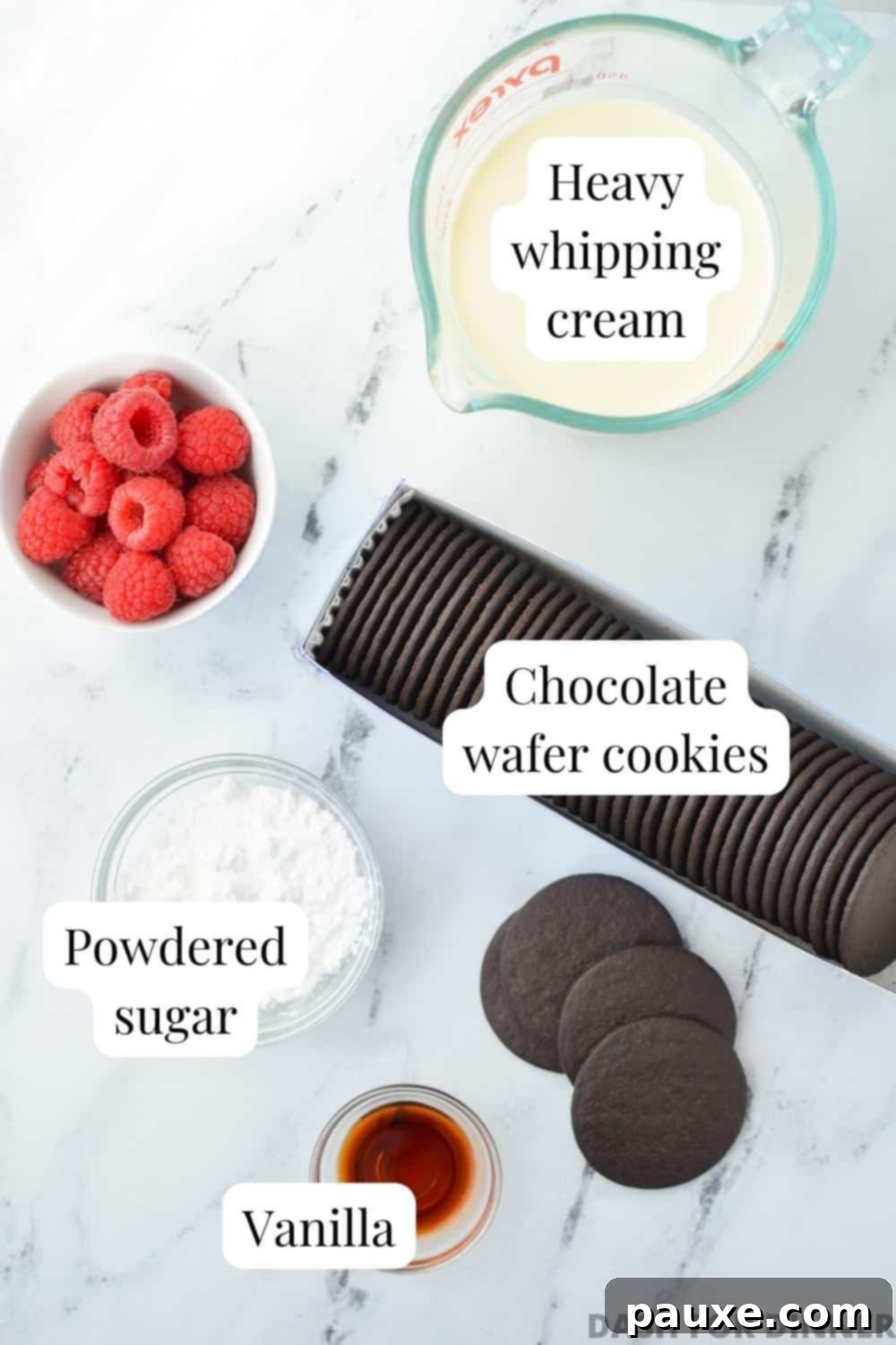 No-Bake Chocolate Wafer Zebra Delight 3 The essential ingredients neatly arranged for making a delicious icebox cake: chocolate wafers, heavy cream, vanilla extract, and powdered sugar.