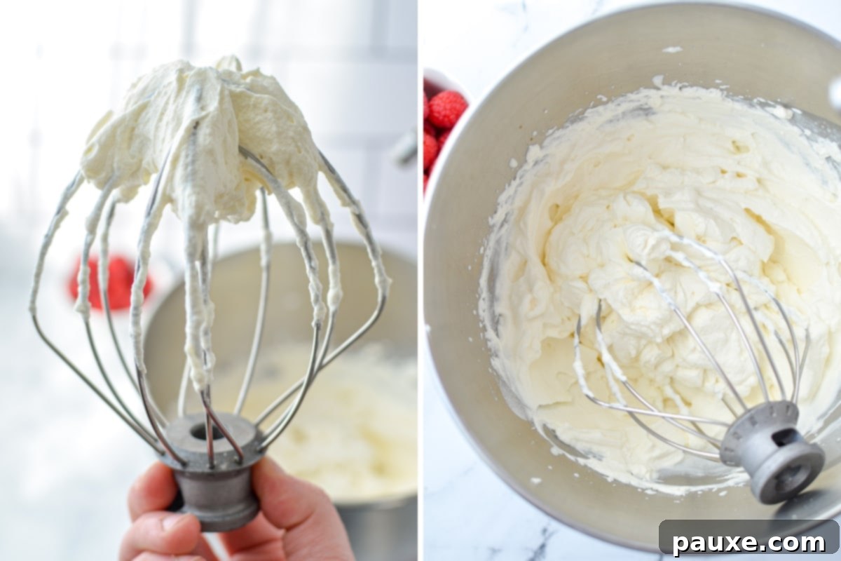 Whipped cream on a stand mixer whisk.